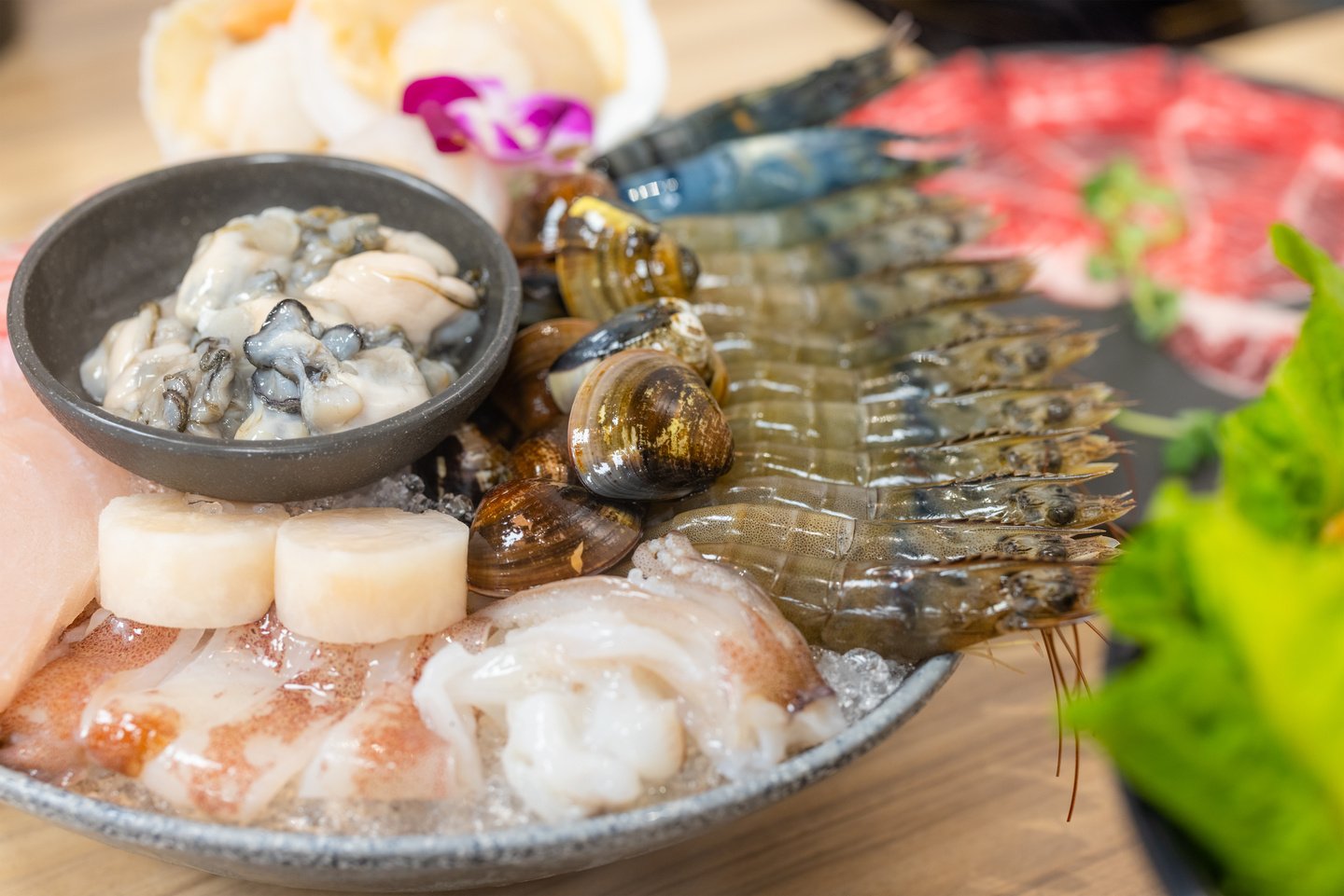 Bowl of seafood for hotpot in restaurant